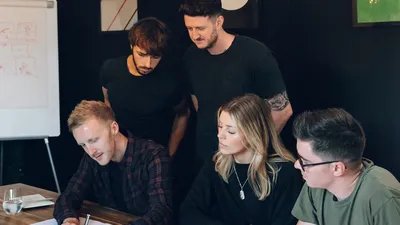 The team go through some new website witreframes